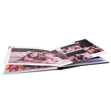 Libro de fotos de tapa dura de 27.94 cm x 35.56 cm  con diseño personalizado.