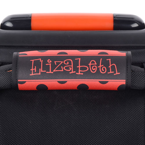 Envoltura de asas del equipaje personalizada con lunares negros y rojos.